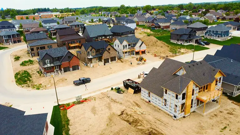 New construction home with a newly installed roof