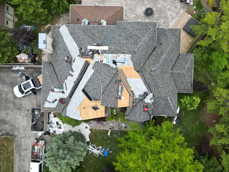Aerial view of a completed Cardinal Premier Roofing shingle roof